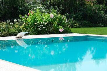 צימר Eco Resort Parco Botanico Fiorlago