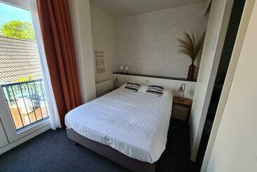 تختخواب و صبحانه Boutique Hotel De Raetskamer