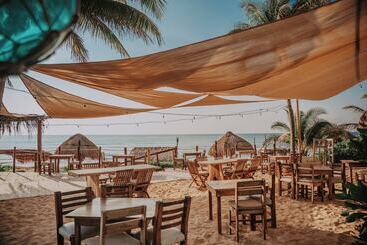 Petit Lafitte Beach Front Hotel & Bungalows