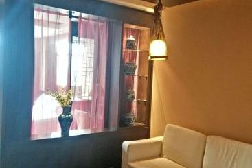 Baolong Homelike Youyi Hotel