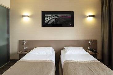 בית מלון כפרי Grand Prix Hôtel & Restaurant