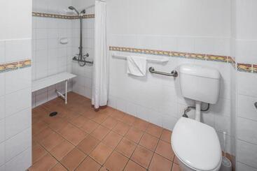 Отель The Observatory Self Contained Apartments