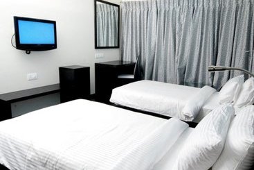 Отель Clarks Inn Suites