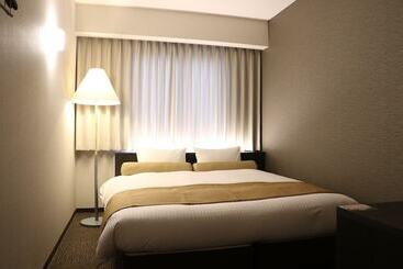 Отель Minamisenri Crystal