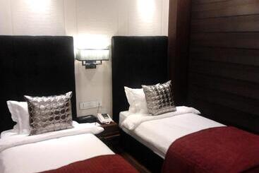 Отель The Nanee Suites