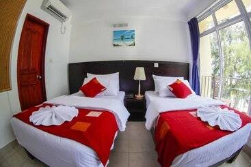 فندق Sunny Suites Inn