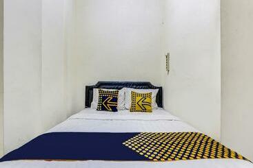 هتل Spot On 90780 Gang Tengah Homestay Syariah