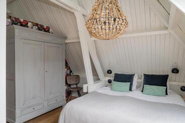 تختخواب و صبحانه De Verwennerie