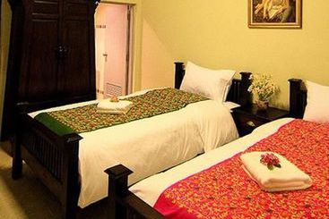 Отель The Castle Chiangmai