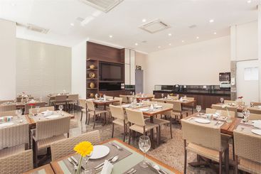 Отель Esuites Sion  Savassi