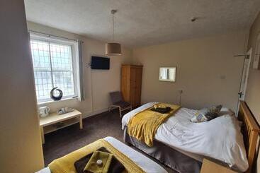 בית מלון כפרי The Stump Cross Inn