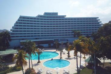 Отель Paradise Puerto La Cruz