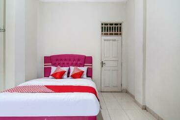 호텔 Oyo 90942 Kost Syari Ah Panam