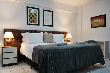 B & A Suites Inn Hotel Quarto Luxo âmbar