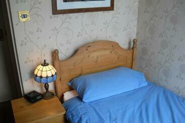 펜션 Shemara Rooms