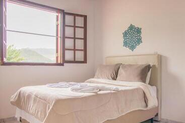 ペンション Pousada Girassol