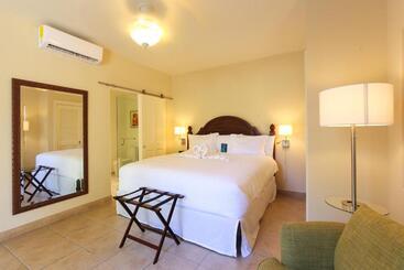 هتل Bungalows At Windsong On The Reef