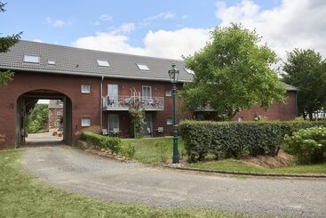 酒店 Ferienwohnungen Burg Blens