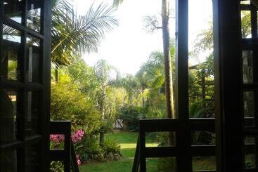 ペンション Pousada Além Do Jardim