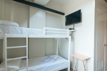 Отель Filmore Suites Makati By Reddoorz