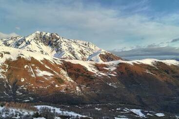 ツーリストアパートメント Appartement Au Pied Des Pistes