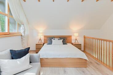 آپارتمانهای توریستها Sengirės Kotedžai Juodkrantė