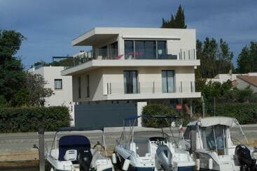 דירות לתיירים Superbe Villa Vue Mer 4 Etoiles 10 Couchages Piscine Chauffe