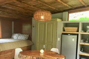 Жильё для туристов Acogedora Cabaña En El Bosque, Via La Calera