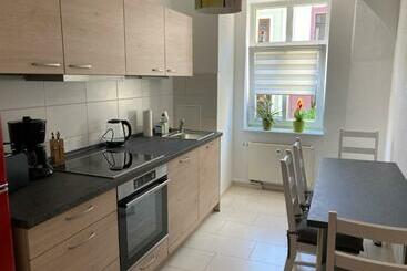 ツーリストアパートメント Ferienwohnung Zwönitz