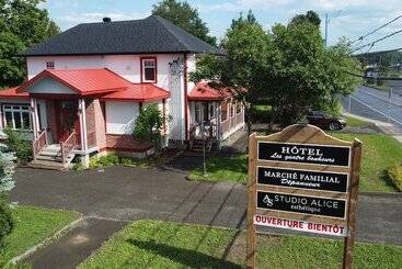 فندق Hôtel Les Quatre Bonheurs