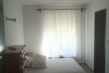 펜션 Hostal Restaurante El Burguiyo