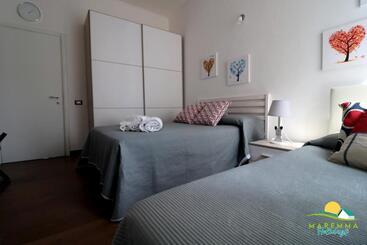 ツーリストアパートメント Maremma Holidays Trento Apartment