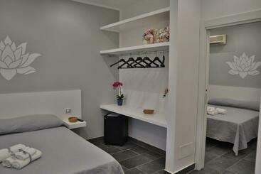 مبيت وإفطار Fiore Di Loto Rooms