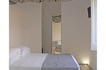 تختخواب و صبحانه Quintessenza Charme Rooms