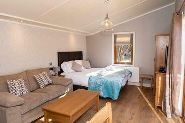 渡假胜地  Herons Lake Retreat Hot Tub Lodges