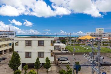 Апарт-отель Mr.kinjo Inn 下里南