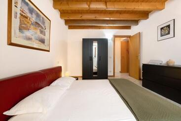 Жильё для туристов Appartamento Gargnano