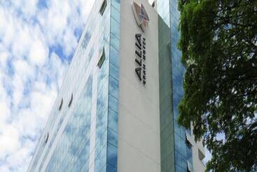 Отель Allia Gran Pampulha Suites