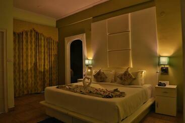 Отель Drona Palace By Sr Leisure Inn