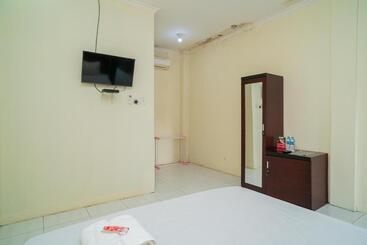 בית מלון כפרי Reddoorz Syariah @ Jalan Bukit Kaminting 2