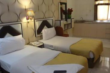 Отель Al Kawakeb