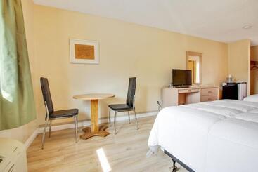 مُتل Rotex Western Inn