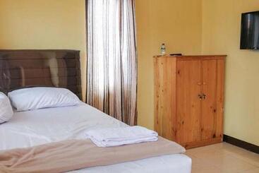 ホテル Risqia Syariah Tod M1 Bandara Soekarno Hatta Mitra Reddoorz