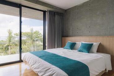 アパートホテル Bosco Yomitan Resort Condminium