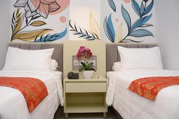 Отель Kesuma Front One Boutique  Palembang