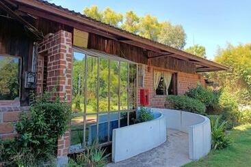 فندق Centro Ecoturistico Del Lago