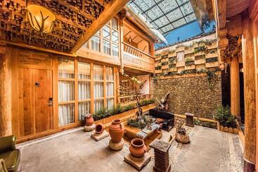 Отель Lijiang Yongshe Inn