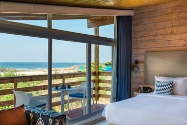 בית מלון כפרי Living Room Beach Resort