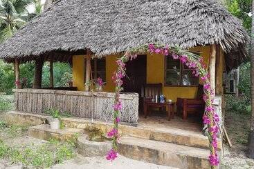 بنسيون Mike S Beach Cottages