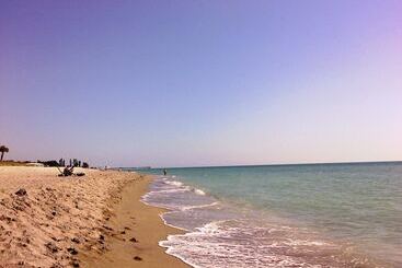 Отель Venice Villas On The Beach